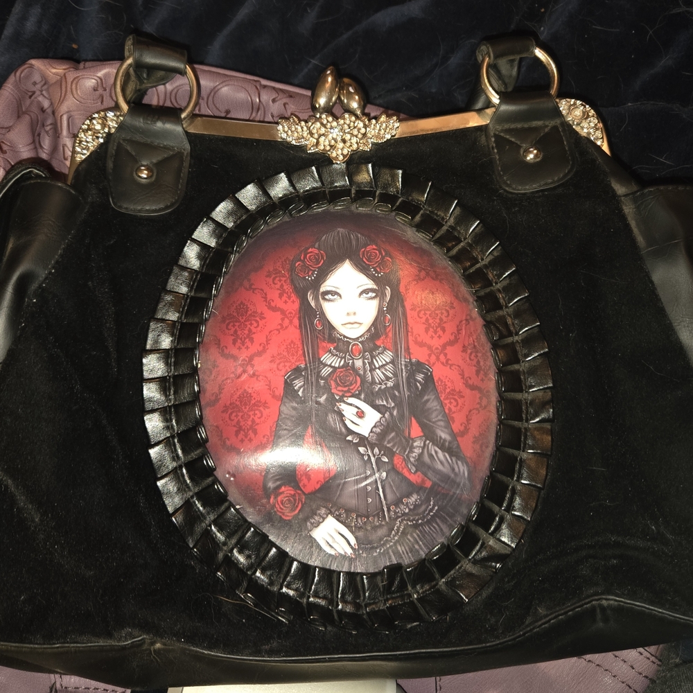 Black and Red Gothic Shoulder Bag with Medallion Design